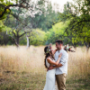 bride-and-groom-hugging-at-the-wedding-in-nature-Z2AVSJ4